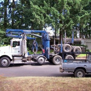 Here is a size comparison between the self-loader and my husband's 1980 Nissan King Cab pickup. You can see the rear has been pulled up onto the main 