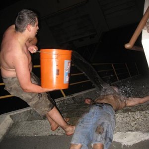 Couple of students combining clean-up with water boarding…this was before it was declared torture LOL and was still considered fun and interesting.