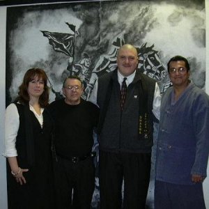 I got my profile pic from this shot of me, my teacher, a colleague, and our master. This was at the 2004 Black Belt banquet in Arizona.