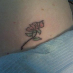 Here is a rose tattoo (yes, it was flash *sigh*) after Painless Ric re-drew the outline. I do like the outline on this tat - for me it brings out some