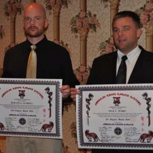 Mr Averall and Mr Ward's Black Belt Certificates