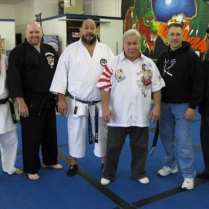 Tony Martinez Sr. in a group photo with instructors