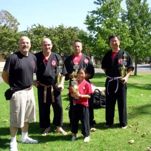 John Bishop, Danjo (With 1st place sparring trophy) and other Bishop Kaju students. Summer 2007