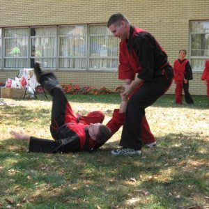 Me demonstrating The Dance of Pain on a student at a Demo