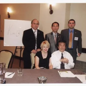 Front row (l-r) Mrs. Hwang, and GM Jack Hwang. Back row (l-r) GM Sergio Chavez, GM James Lee, myself.