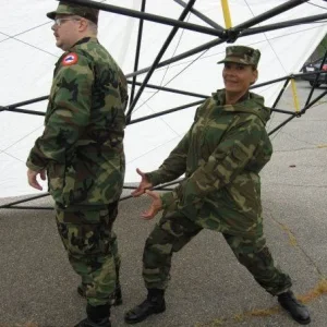 Pvt. Moynihan and Sgt. Alejandro goofing around unbeknownst to Pvt. Moynihan (The Sergeant Major had told her to "Stop grabassing and get going") (Cam