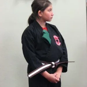 My oldest after her Jr. Brown Belt promotion