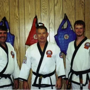 Me after my 4th dan test with my father (left) and my Sah Bum Nim (center)