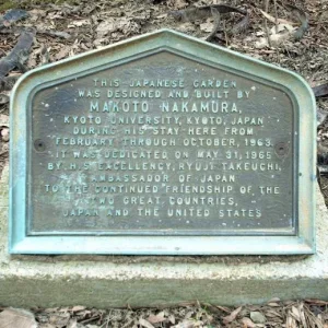 Bronze plaque at the entry of the garden