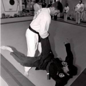 Take down against a front kick attack. Photo was taken by Tom Pennington, UTA Shorthorn photographer, in 1995 for a story.