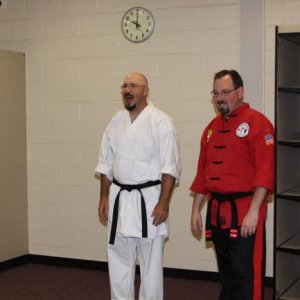 Having a great time while teaching at the Annual KFCI Homecoming. Watching the participants and talking with Sensei Scott Catoe 5th Dan.