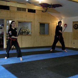 Doing my bo staff form as part of my black belt test, December 2004