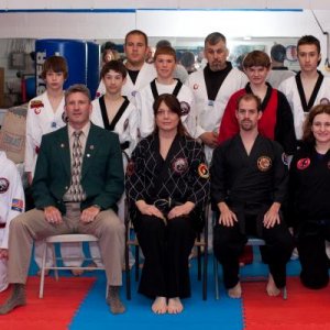 Posing with all the black belts after my Tae Kwon Do black belt test. May 2009