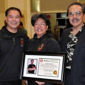My uncle & aunt with GM Max Pallen displaying his promotion to Lakan pito 7th degree