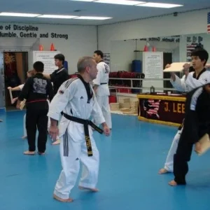 My 3rd dan black belt test, 4 station board breaking. There were a lot of board breaks that day, LOL!!!