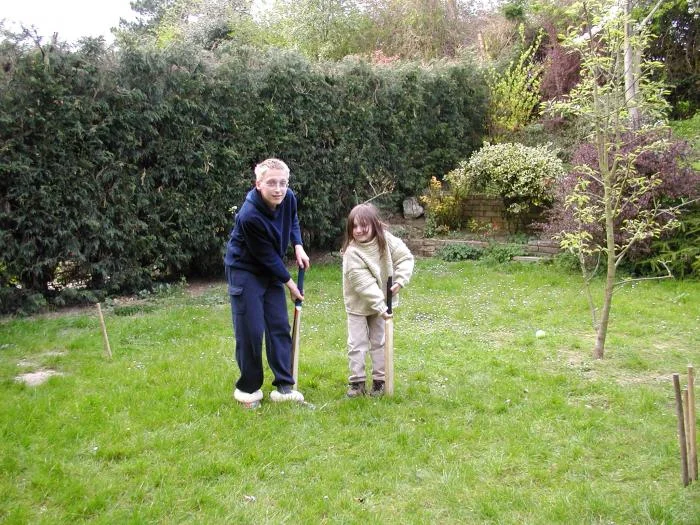 Adrian as a young child learning cricket