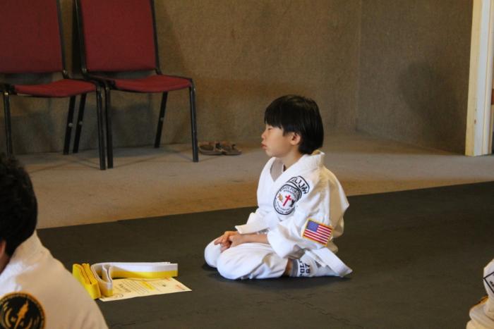 Ahh the good old belt sneek in front of the students while they are meditating!