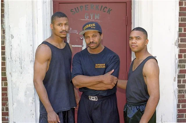 Jason "Quiet Riot"Robinson, Kevin "Superkick" McClinton, & Reggie "The Boss" Givan taken June 1996. In the 20 years Kevin ran Superkick Gym he only aw