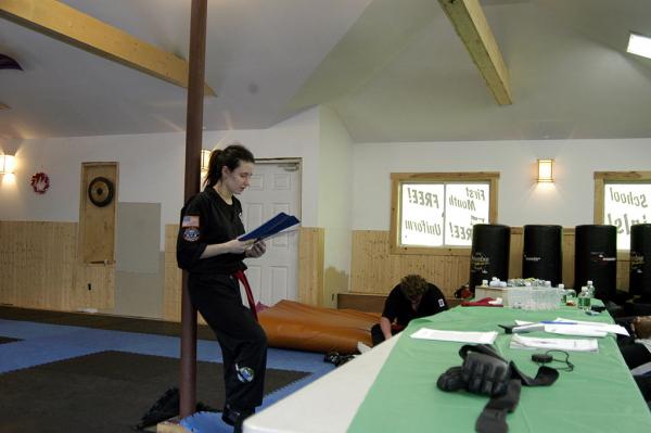 Just finished testing for my first black belt here, reading my essay about what becoming a black belt means to me. (December 2004)