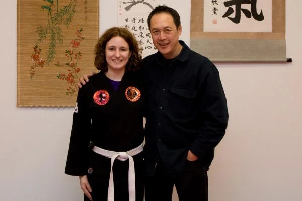 Leon Jay was at my yellow belt test in Small Circle Jujitsu down in Indianapolis, posing with him after the test. March 2008