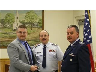 Me( far left), MAJ Tom Lyons and 1LT Dan Parsons at my Jan 2008 Civil Air Patrol promotion to 2LT