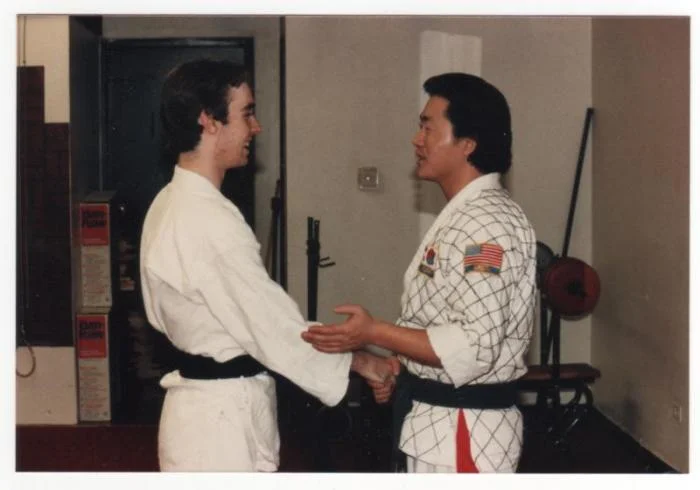 Me receiving my 1st dan black belt from Master Yun Kil Kim in 1985. It seems like yesterday.