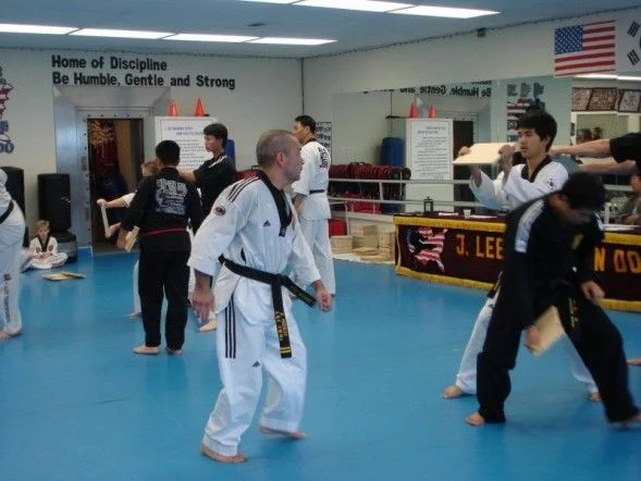 My 3rd dan black belt test, 4 station board breaking. There were a lot of board breaks that day, LOL!!!