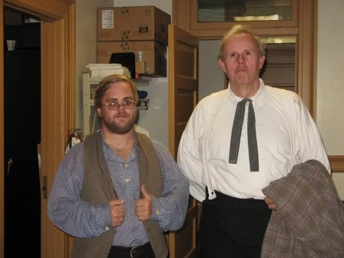 My fiancee and a guy ready for acting in a play!