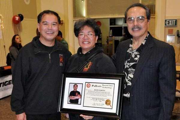 My uncle & aunt with GM Max Pallen displaying his promotion to Lakan pito 7th degree