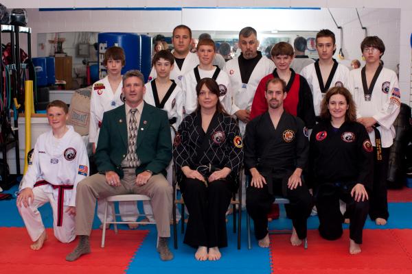Posing with all the black belts after my Tae Kwon Do black belt test. May 2009