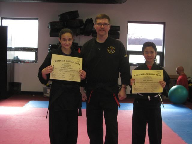 Sophia and Ashley being promoted to Black belt and JR black belt! May 2014