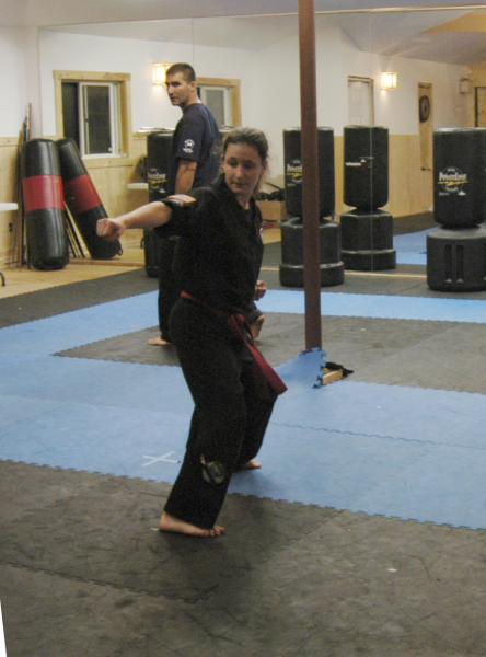 Testing for my red belt black stripe, doing forms. June 2004