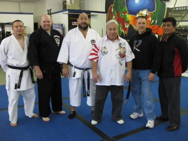 Tony Martinez Sr. in a group photo with instructors