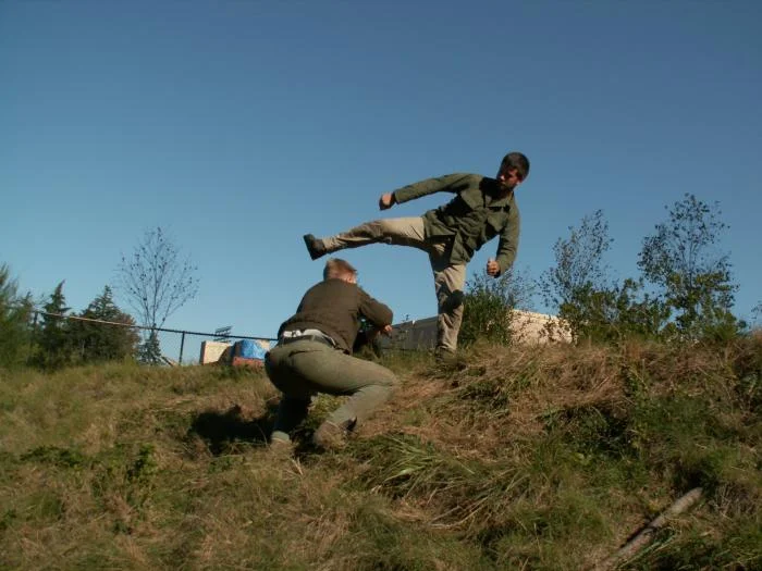 Training outdoors Sat 10 11 08 working on uneven rough ground covered with hidden obstacles and dangers and lessons.