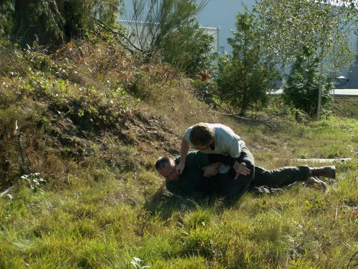 Training outdoors Sat 10 11 08 working on uneven rough ground covered with hidden obstacles and dangers and lessons.