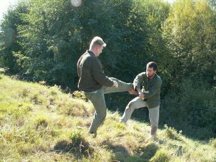 Training outdoors Sat 10 11 08 working on uneven rough ground covered with hidden obstacles and dangers and lessons.