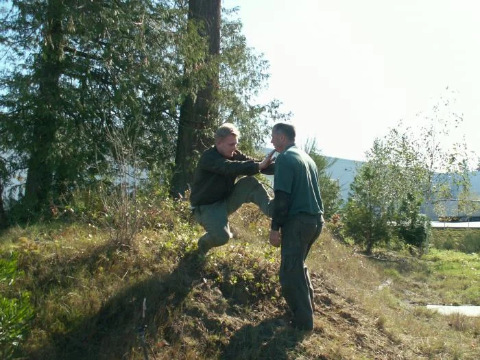 Training outdoors Sat 10 11 08 working on uneven rough ground covered with hidden obstacles and dangers and lessons.