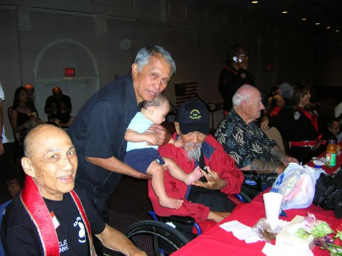 Uncle Frank,dad and Sijo Emperado playing with Akea