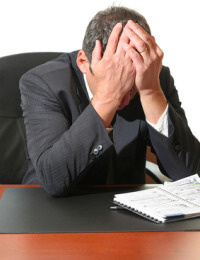 home%20frustrated_businessman%20-%20head%20in%20hands.jpg